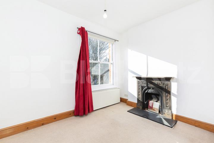 Set on the top floor of a period conversion with high ceilings and exposed brick Rathcoole Gardens, Crouch End